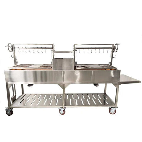 Open Fire Grill Tagwood BBQ24SS Double Argentine Santa Maria Grill 304 SS - Shared firebox - Height-adjustable grates - Interchangeable griddle -Meat hooks - Foldable side table and 6 heavy-duty swivel casters - PRE-ORDER